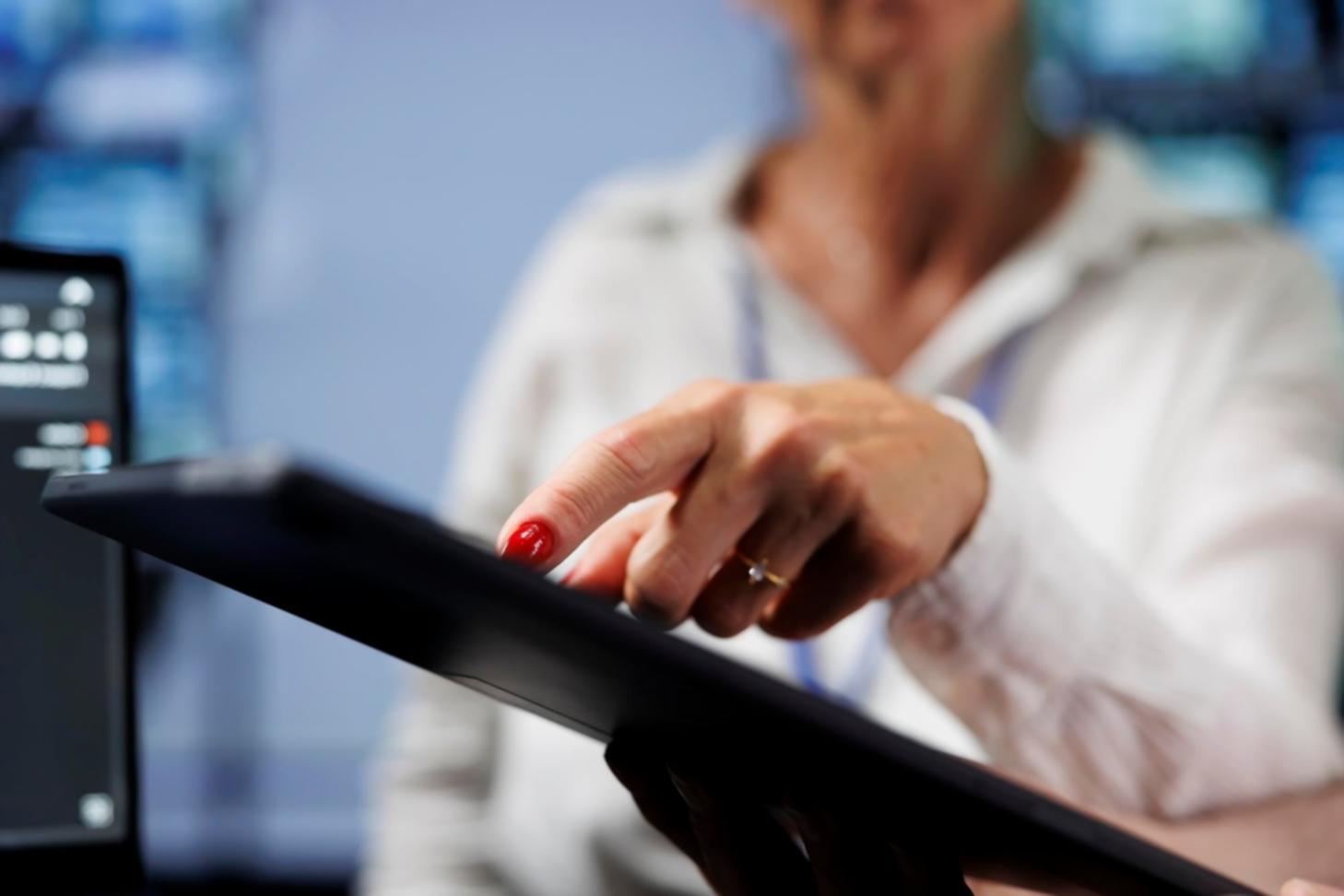 Instructor reviewing security code with students